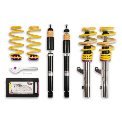 2 assembled vehicle suspension chrome coilovers with yellow springs, 2 black coilovers, 2 yellow springs with 2 purple end fittings, 1 coilover adjustment tool with storage box.