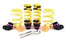 4 yellow height adjustable vehicle suspension springs and adjustment fittings