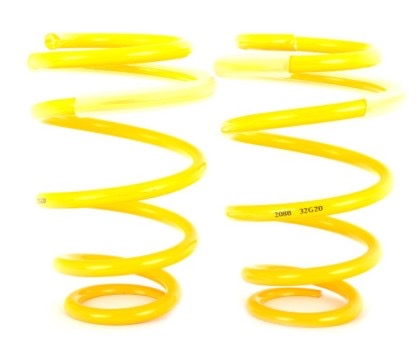 2 yellow vehicle suspension springs