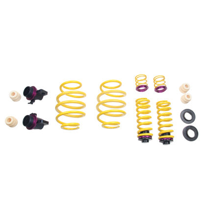 4 vehicle suspension yellow height adjustable springs and spring adjustment fittings