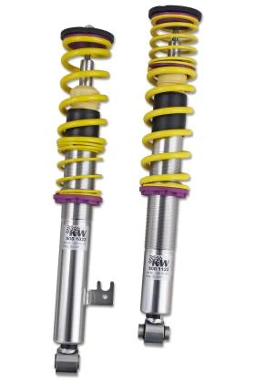 2 chrome and yellow vehicle suspension coilovers
