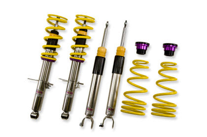 2 assembled vehiicle suspension coilovers with yellow springs and 2 coilover bodies and 2 yellow springs
