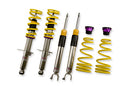 2 vehicle suspension coilovers with yellow springs, 2 coilover bodies and 2 unmounted yellow springs with end fittings