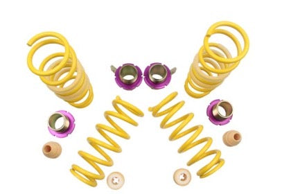 4 yellow vehicle suspension adjustable shock springs with purple end fittings