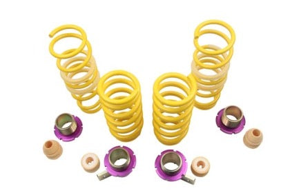 4 yellow vehicle suspension adjustable shock springs and purple end fittings