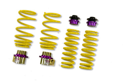 4 yellow vehicle suspension shock springs