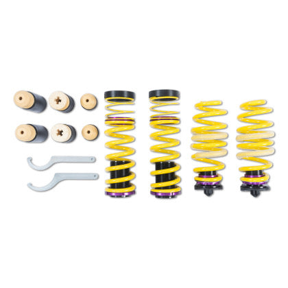 4 yellow vehicle suspension height adjustable springs with 6 end fittings and 2 installation tools