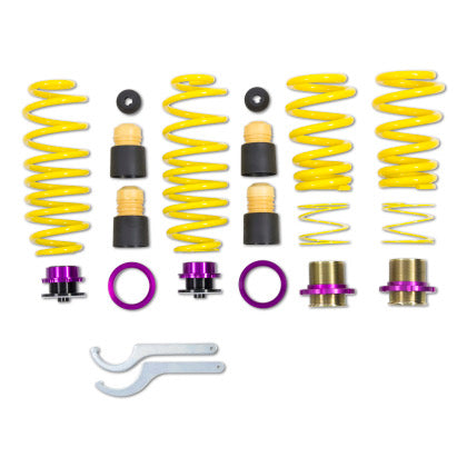 4 yellow vehicle suspension height adjustable springs and spring end adjuster fittings