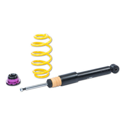 1 vehicle suspension black coilover with 1 yellow spring and 1 purple fitting.