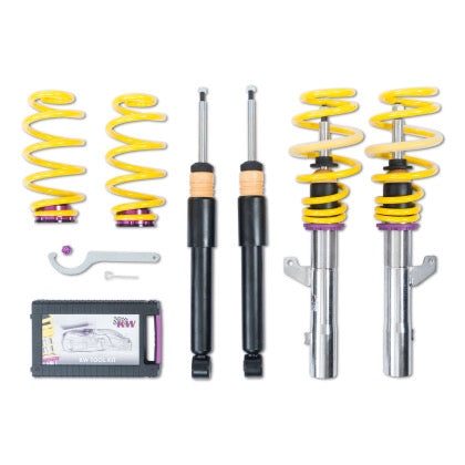 2 assembled vehicle suspension chrome coilovers with yellow springs, 2 black coilovers, 2 yellow springs with purple end fittings, 1 coilover adjustment tool with storage box.