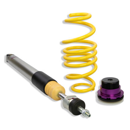1 chrome body coilover, 1 yellow spring and 1 black and purple fitting.