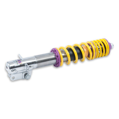 1 vehicle suspension chrome body coilover with yellow spring and purple fittings.