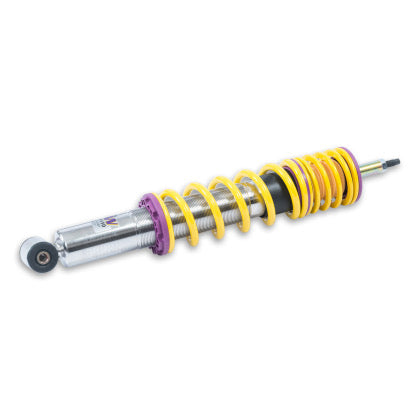 1 vehicle suspension chrome body coilover with yellow spring and purple fittings.