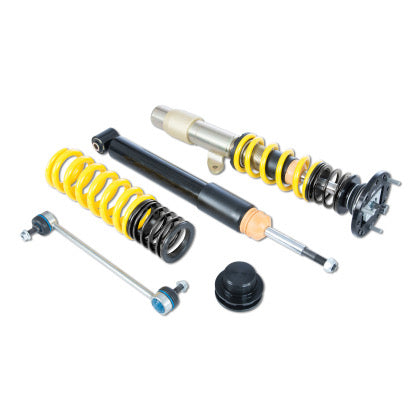 Pair of adjustable  suspension coilvers, one assembled., one unassembled with strut and spring being shown seperately