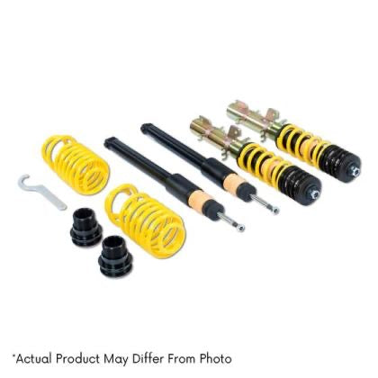 Vehicle suspension coilover kit with two fully assembled coilovers, two black struts and two yellow springs