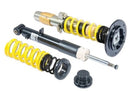 Assembled coilover and an unassembled coilover over showing black strut and  lowering spring seperately