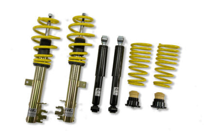 Two assembled vehicle suspension coilovers,  unsleeved coilover struts and two coilover springs