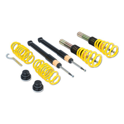 Two coilover struts, two black struts and two lowering springs