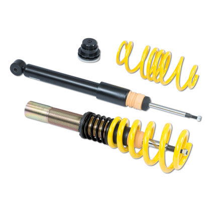 Yellow spring, black strut, and an assembled strut showing spring and threaded sleeve