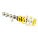 Yellow lowering spring attached to threaded sleeve with black strut