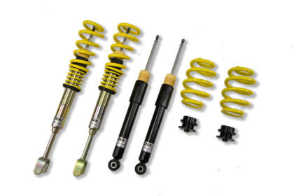 Coilover kit showing two assembled struts, two black struts and two yellow springs