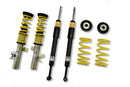 Two vehicle suspension coilovers, two unsleeved coilover sturs and two coilover springs with end fittings