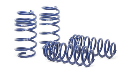 4 blue vehicle suspension lowering springs.