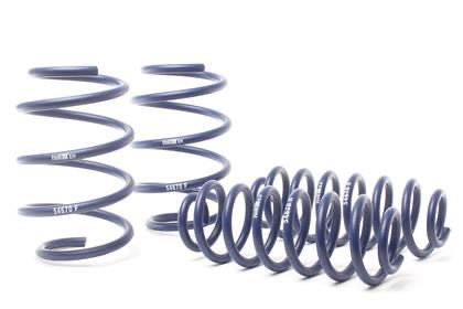 4 blue vehicle suspension lowering springs.