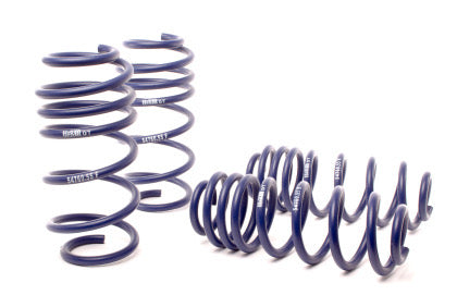 4 blue vehicle suspension lowering springs.