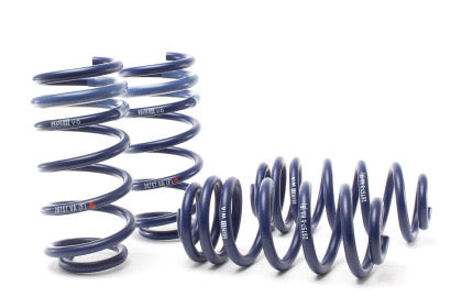 4 blue vehicle suspension lowering springs.