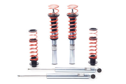2 vehicle coilovers with red springs, 2 unassembled coilvers showing red springs and coilover shocks seperately