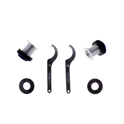 2 coilover spring perch fittings, 2 flat o-rings and 2 coilover adjustment tools.