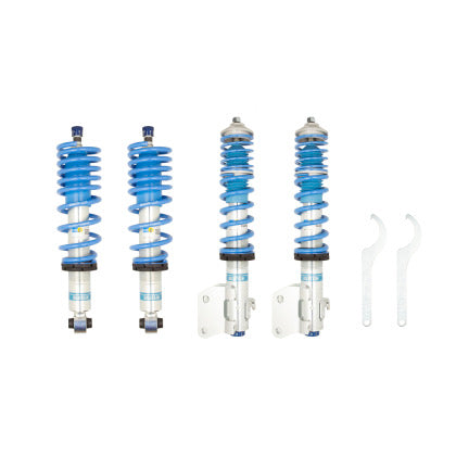 4 Bilstein zinc plated vehicle suspension coilovers with blue strut sleeves and blue springs, 2 coilover adjustment tools.