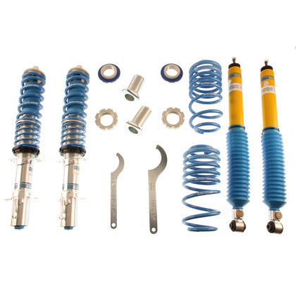 2 zinc coated vehicle suspension coilovers with blue strut sleeves and blue springs, 2 yellow body oilovers with blue strut sleeves, 2 blue springs and 2 coilover adjustment tools with fittings.