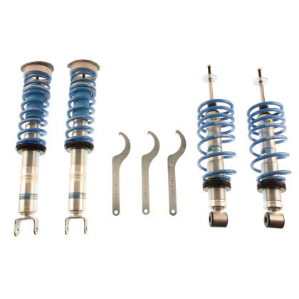 4 Bilstein chrome bodied vehicle suspension coilovers and 3 coilover adjustment tools.