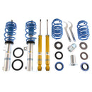 2 assembled vehicle zinc coated suspension coilovers with blue strut sleeves and springs, 2 yellow body coilovers, 2 blue springs, 2 coilover adjustment tools and fittings.