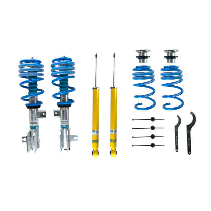 2 Bilstein zinc plated vehicle suspension coilovers with fitted blue strut sleeve and blue springs, 2 yellow bodied coilover struts, 2 blue springs with spring perch fittings and 2 coilover adjustment tools.