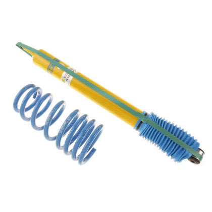 1 yellow body vehicle suspension coilover with blue sleeve and 1 blue spring.