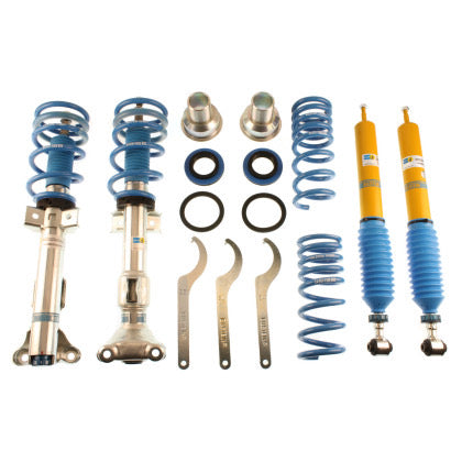 2 zinc plated vehicle suspension coilovers with blue strut sleeves and springs, 2 yellow bodied coilover struts with blue sleeves, 2 blue springs and 3 coilover adjustment tools with installation fittings.