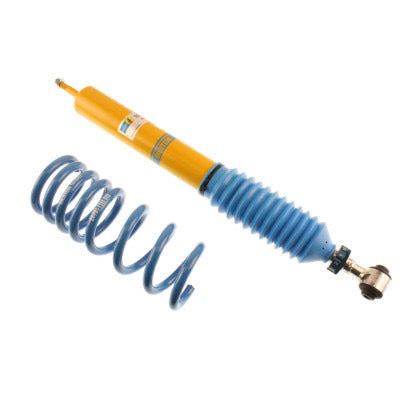 1 yellow body coilover strut with blue sleeve and 1 blue spring.