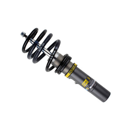 Gray bodied vehicle suspension coilover strut with fitted black spring and yellow accents.