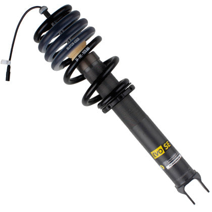 Gray bodied vehicle suspension coilover with fitted black spring.