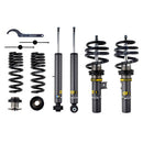 2 gray bodied vehicle suspension coilovers with fitted black springs and yellow accents, 2 gray bodied coilovers, 2 black coilover springs and 2 fittings with coilover adjustment tool