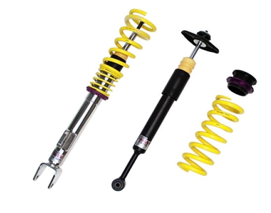 1 assembled vehicle suspension chrome coilover with yellow spring, 1 black coilover body and 1 yellow spring with black end fitting.