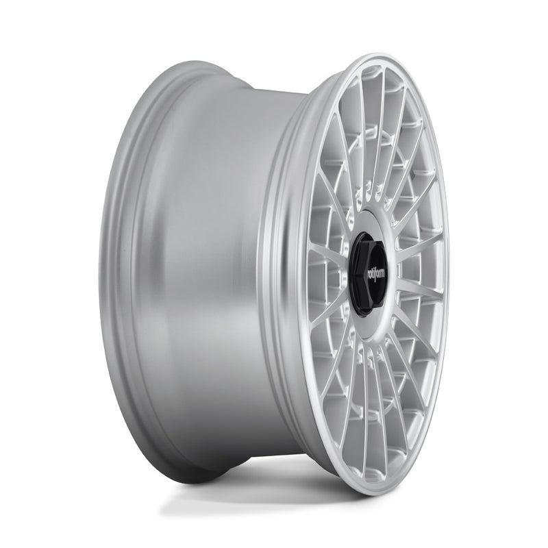 Side view of a Rotiform LAS-R monoblock cast aluminum multi spoke automotive wheel in gloss silver with a black center cap having a silver Rotiform logo.