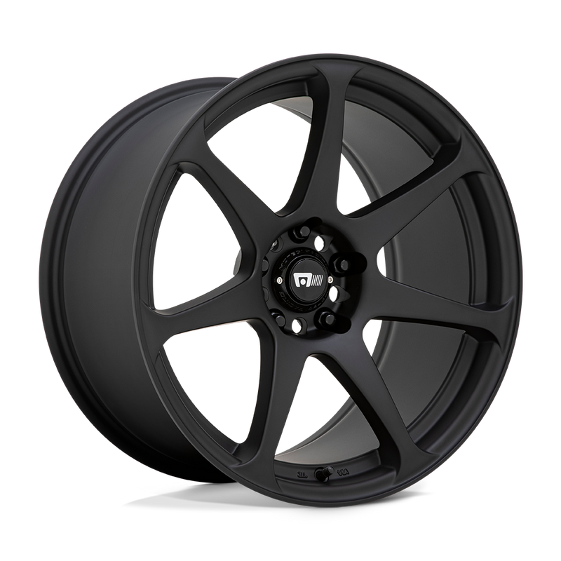 Motegi Racing Battle cast aluminum 7 spoke automotive wheel in a matte black finish with a black center cap displaying a silver Motegi logo.