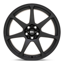 Front face view of a Motegi Racing Battle cast aluminum 7 spoke automotive wheel in a matte black finish with a black center cap displaying a silver Motegi logo.