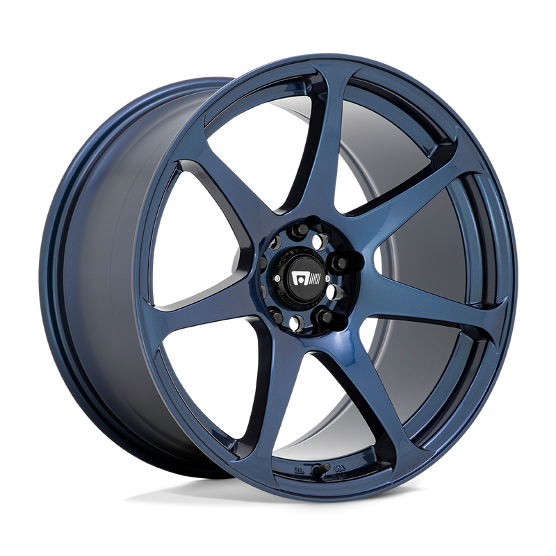 Motegi Racing Battle cast aluminum 7 spoke automotive wheel in a midnight blue finish with a black center cap displaying a silver Motegi logo.