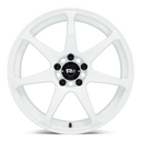 Front face view of a Motegi Racing Battle cast aluminum 7 spoke automotive wheel in white with a black center cap displaying a silver Motegi logo.