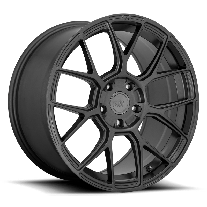 Motegi Racing CM7 cast aluminum V and rectangular shaped spoke pattern automotive wheel in a gun metal gray finish with a Motegi logo center cap.